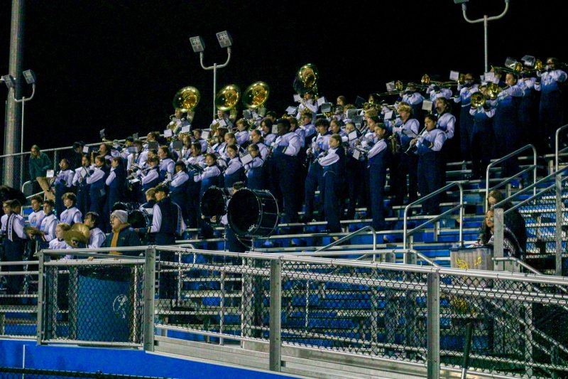 The Cape marching band keeps the energy going despite the chill creeping in.