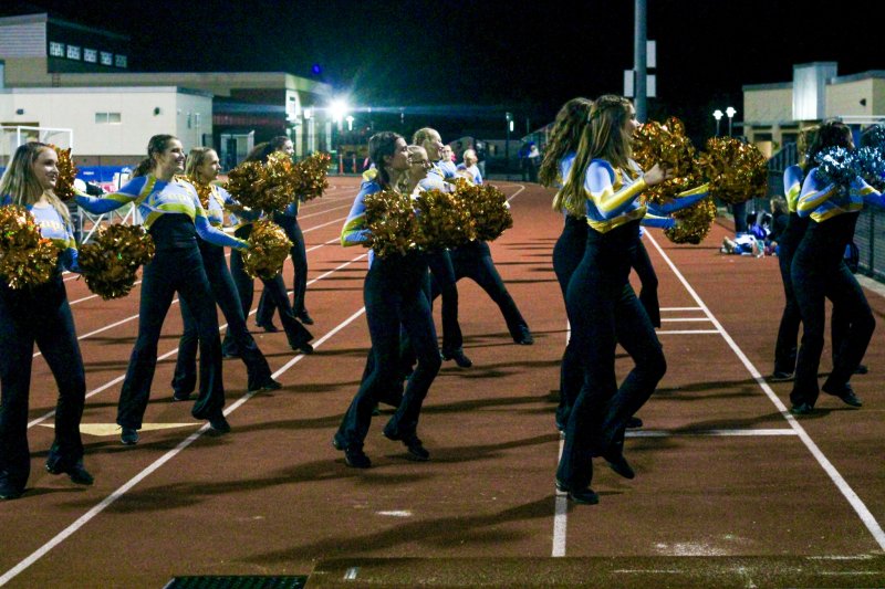 The dance team syncs up with the marching band following a Cape touchdown.