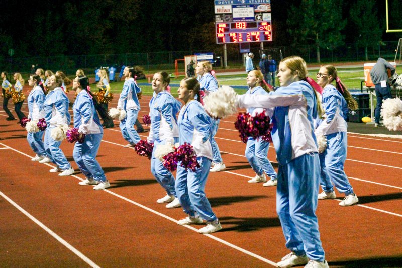 Cape cheerleaders cheering on big blue.