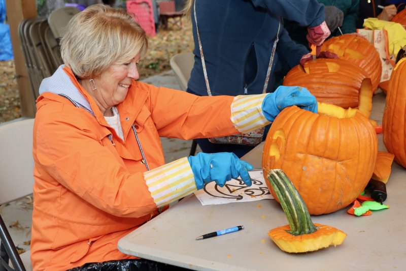 Joan Marshall from the Zwaanendael Women’s Club and Historic Lewes seems determined to make her pumpkin look good. Members of the Z Club, Lewes in Bloom and Historic Lewes carved pumpkins at the Shipcarpenter Campus Oct. 29. The pumpkins will be placed in Zwaanendael Park and lit up on Halloween night. BILL SHULL PHOTOS