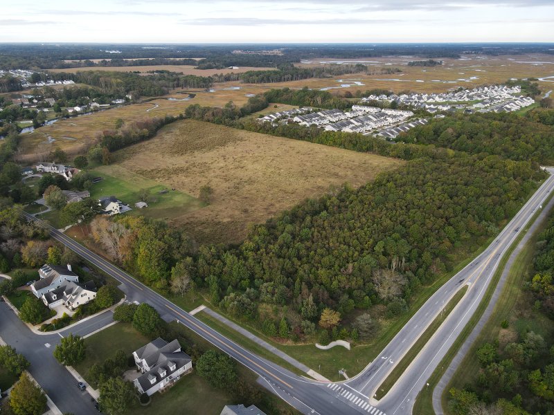 An aerial view of the 20-acre parcel at the corner of New Road and Park road in Lewes. City tree commissioner Mardie Thompson is proposing using a Delaware Forest Service grant to plant thousands of trees on at least part of the land. She said the city would pay about $10,000, or 10% of the total cost. NICK ROTH PHOTO