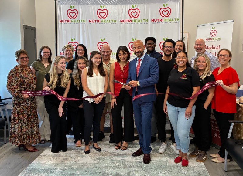 NutriHealth ribbon-cutting attendees shown are in back (l-r) April Taylor, Nancy Pinera, Linda Gonzalez, Lou DiMeglio, Jayleel Norman, Michael Nguyen, Chelby McCall and Steve Buck. In front are Eileen Giaimo, Reagan Gamuciello, Kayla Waples, Stefania Morales, Helena Helou, Dr. Beshara Helou, Krystena Mitchell, Sumer Walker and Jen Rose. SUBMITTED PHOTO