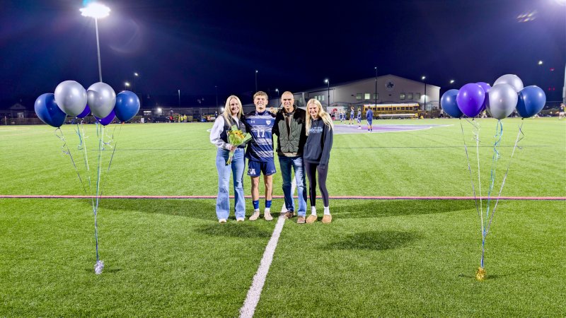 Seahawks senior Chase Ballinger walked with his mom Christy, dad Jeff and sister Paige.