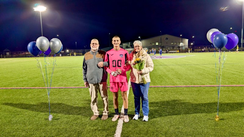 Seahawks senior Austin Taylor walked with Kynia and Tom Taylor.