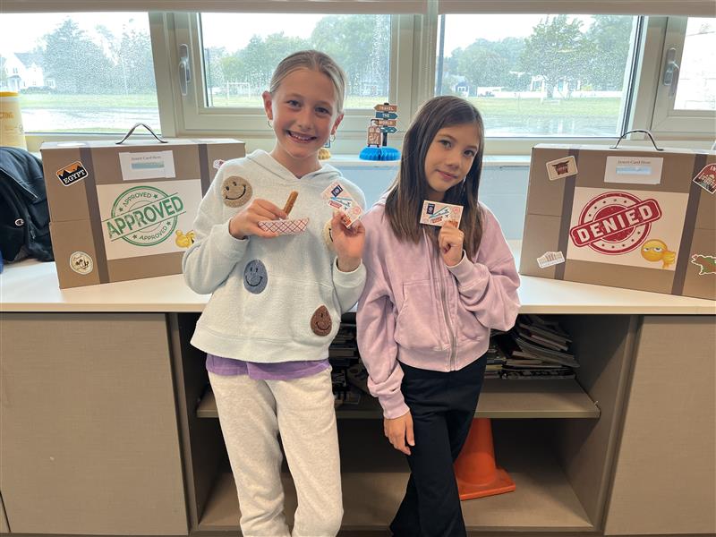 Rehoboth Elementary fifth-graders getting ready to cast votes for their favorite dishes are Caroline Mallon, left, and Naia Thomas. SUBMITTED PHOTOS