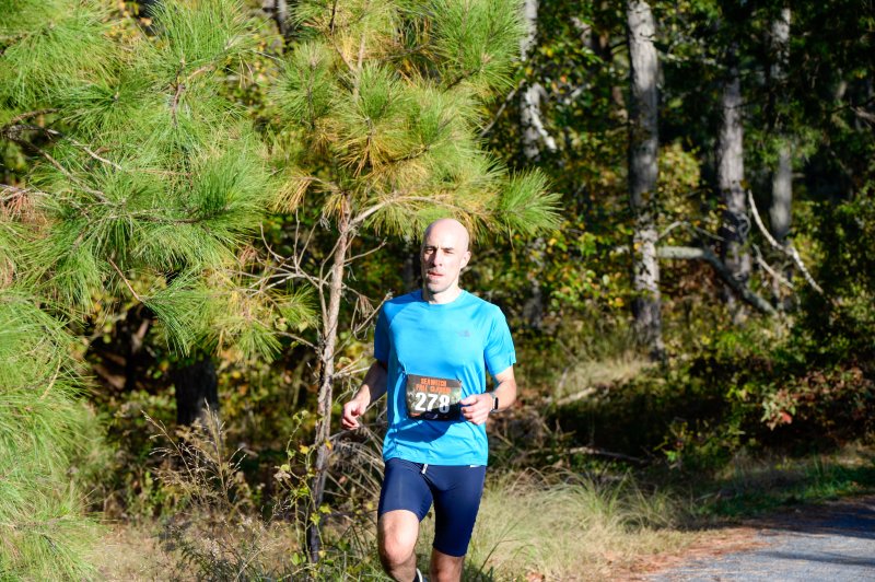 Justin Mann wins the masters race with a time of 1:28:22.