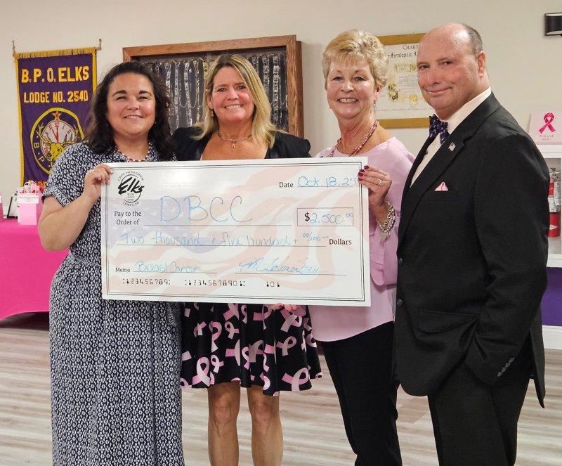 Delaware Breast Cancer Coaltion check presentation attendees shown are (l-r) Meridith Rothstein, coalition survivorship specialist; and Elks representatives Joy Schreck, Terrie Bradley and Marty Schreck. SUBMITTED PHOTOS
