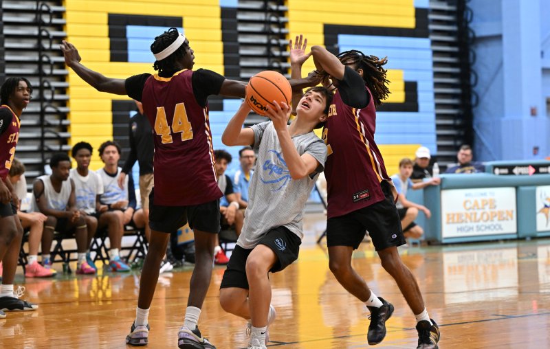 Sophomore Ben Hill crunches through the St. Elizabeth defense.