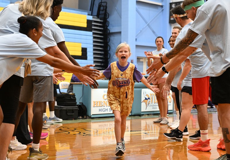 Nora Bekeshka, age 7, is introduced with the Wiz Kids.