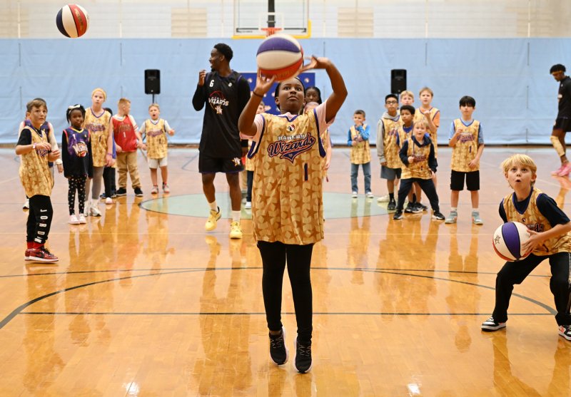 Wiz kid Alivia Mosley takes a jumper in the paint.