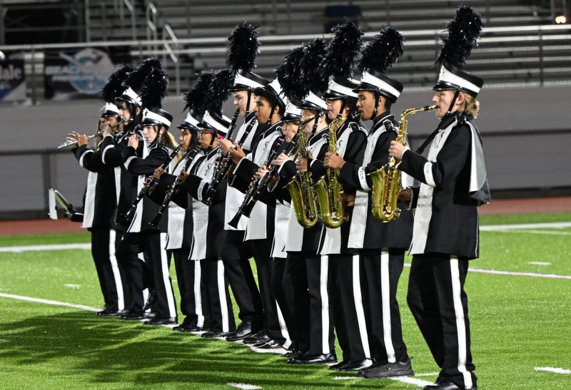 The Sussex Tech marching band entertains the large crowd at Legends Stadium.