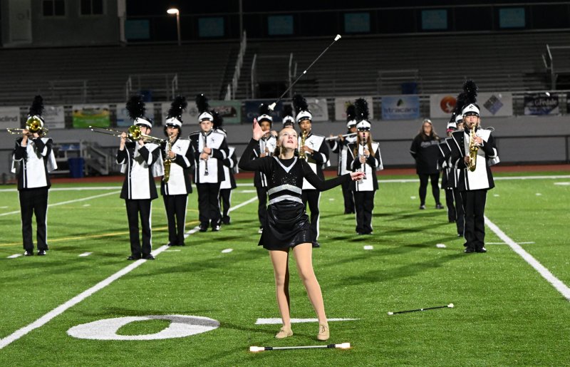 Kaylee Popelas performs with the baton for the Sussex Tech marching band.