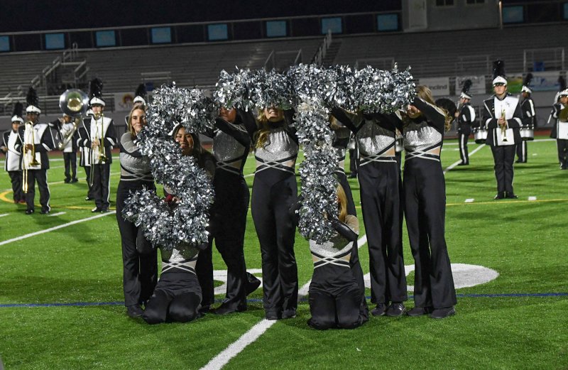 The Sussex Tech dancers construct ST.