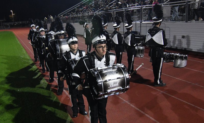 John Olakowski leads the Ravens’ drum line.
