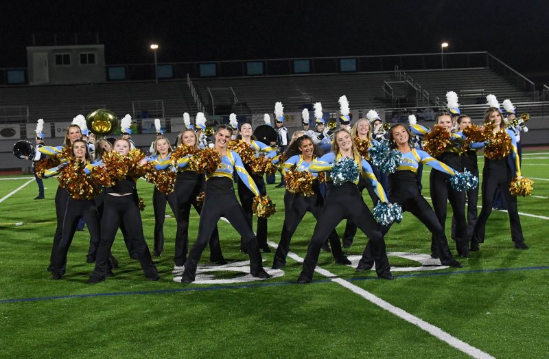 The Cape dance team performs with the marching band.