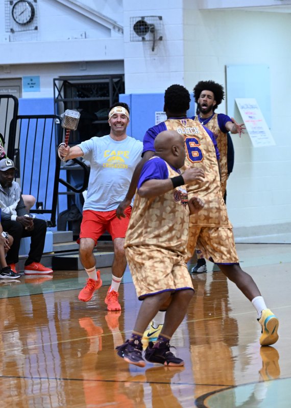 Cape Crusader and Coast TV’s Charlie Sokaitis chases A-Train with Thor’s hammer.