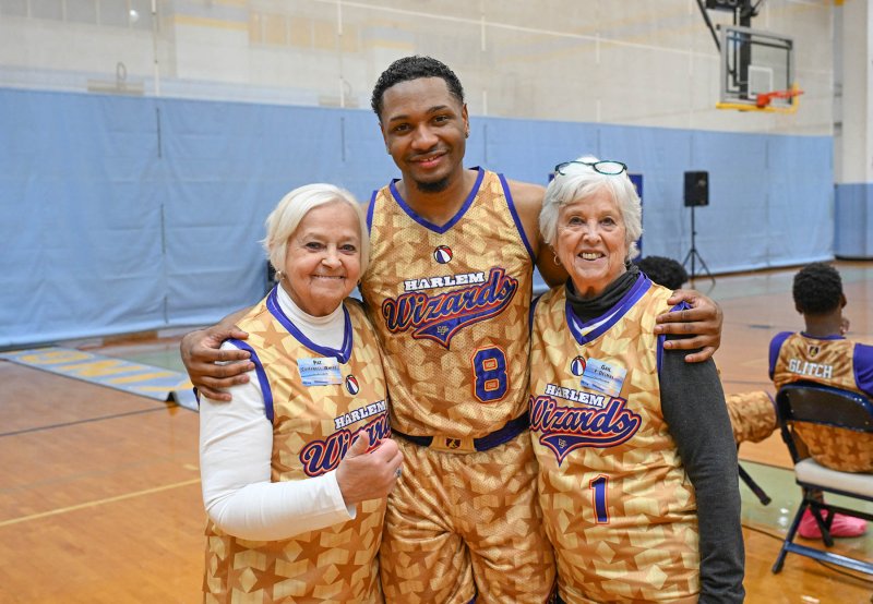 Livewire, aka Devon Curry, center, stands with event co-chairs Pat Campbell White, left, and Gail Dejmal. Campbell-White and Dejmal are both past presidents of Rehoboth Beach Sunrise Rotary Club.