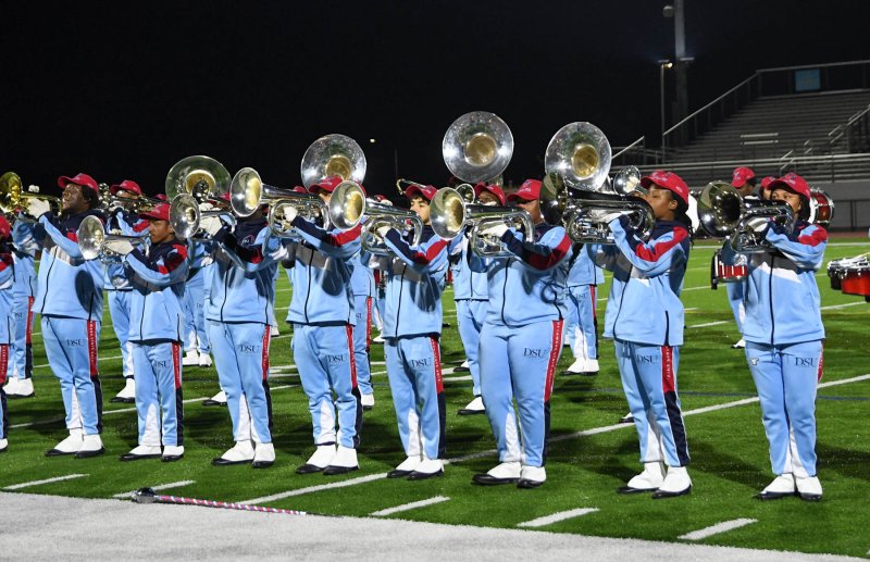 The Delaware State University marching band brass section wails out a tune.