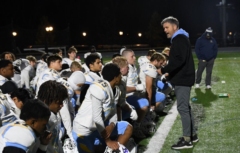Cape head coach Chip Knapp speaks to his troops after the 31-12 loss to Salesianum.