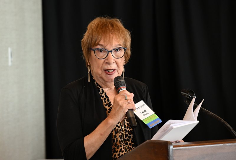 Founder and Board member Sarah Gilmour speaks to attendees about the event.