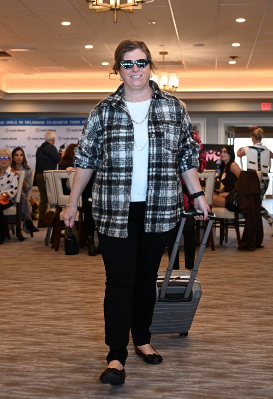 Shelia Ryan wears a shacket outfit from Proof.