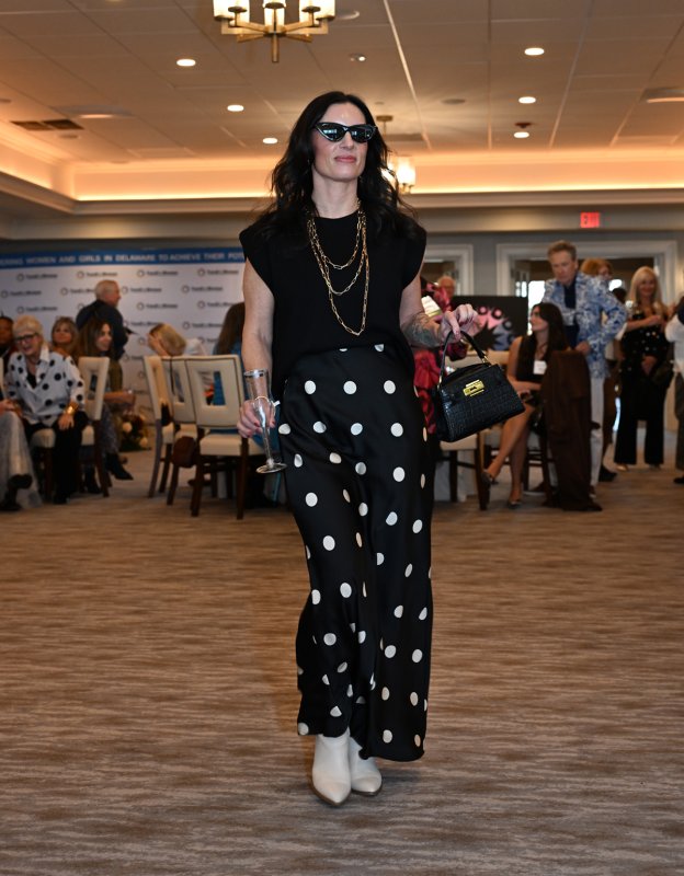 Ashley Catlett wears a polka dot outfit from Proof.