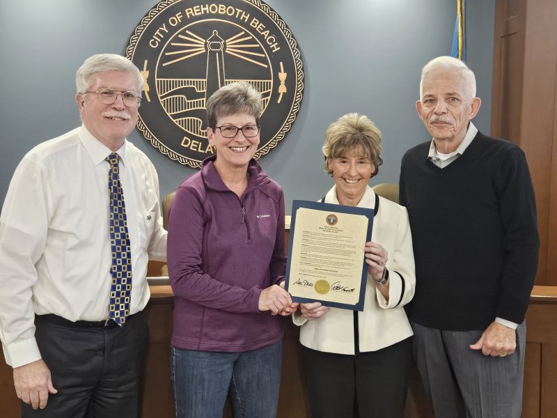 Rehoboth Beach officials read a proclamation in support of Small Business Saturday during a meeting Nov. 21. Shown are (l-r) Mayor Stan Mills, Rehoboth Beach Main Street volunteer Carolyn Diefenderfer, Rehoboth Beach-Dewey Beach Chamber of Commerce President Carol Everhart and Commissioner Patrick Gossett. SUBMITTED PHOTO