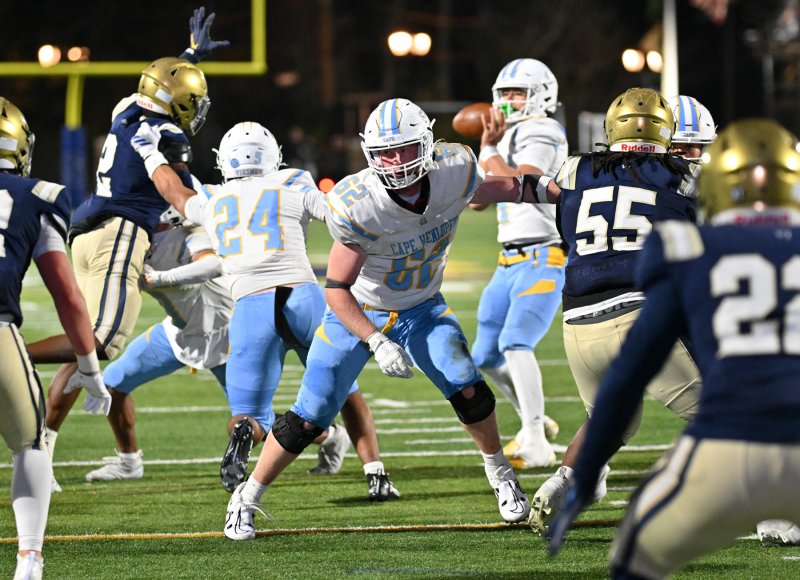Liam Ramsey pass blocks for Cape quarterback Jameson Tingle.