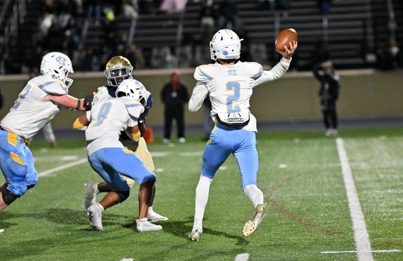 Cape quarterback Mikey Thompson throws out to the flat.