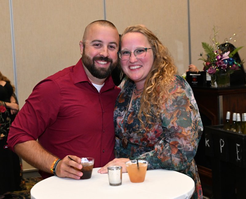 Scott and Amanda Martz have a cordial at the event.