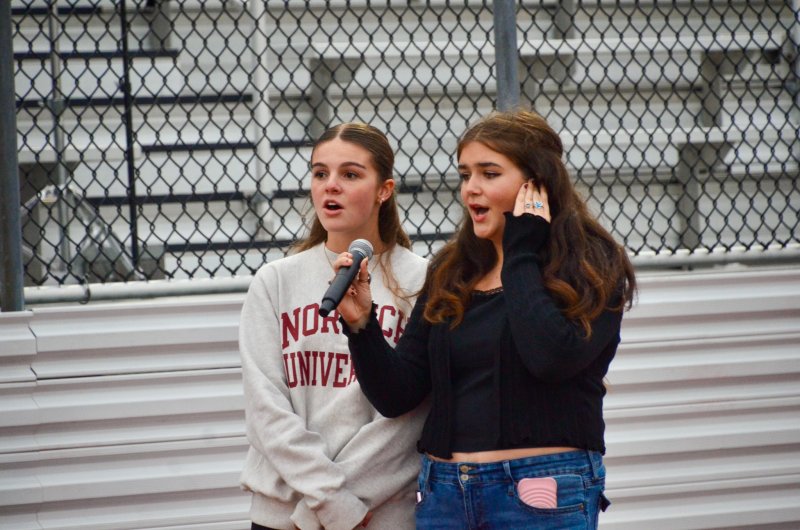 Marley Fyock and Anna Currence sing the national anthem before the game.