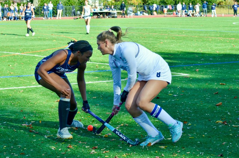 Seahawks captain Ryan Lowe gets a tap past her defender.