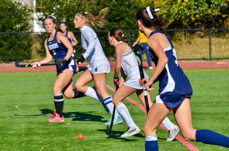 Sussex Academy freshman Mady Lehman leads the charge out of the defensive third.