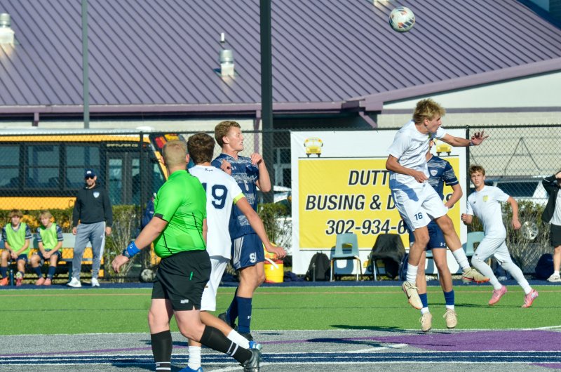 Cape junior Seth Benjamin forces the defense to react after winning a header at midfield.