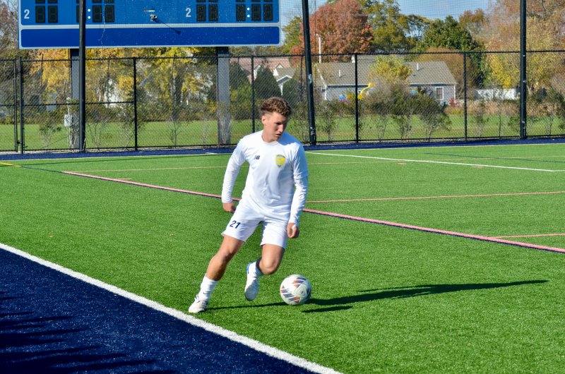 Cape junior Austin Tyndall takes control along the boundary.