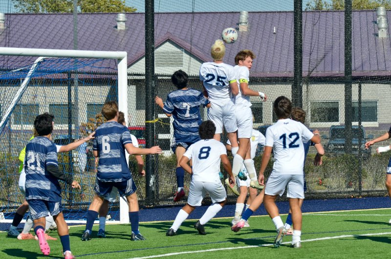 Cape senior Brenner Short rises up to win a corner for the defense.
