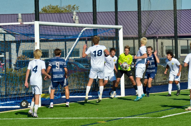 Cape junior keeper Anton Schierenberg hauls in a corner at the far post.