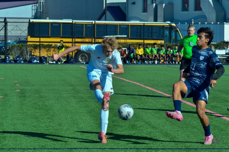 Cape junior Keegan McMahon tries to get a ball past Sussex Academy junior Brandon Jaimes.