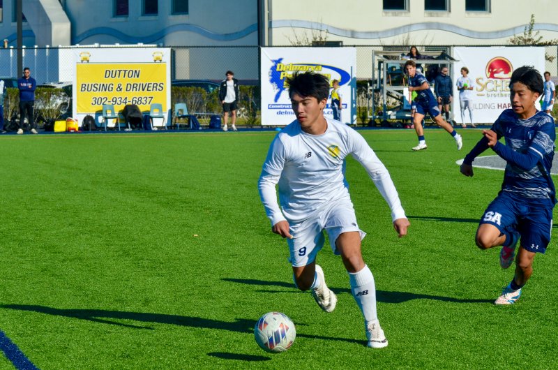Vikings senior Will Burke carries into the attacking third.