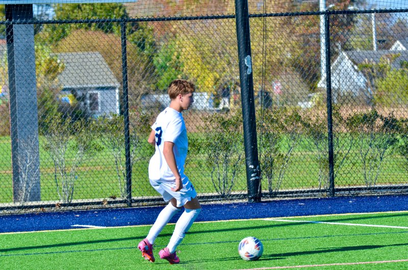 Vikings freshman Logan Cortijo controls the ball in the corner.