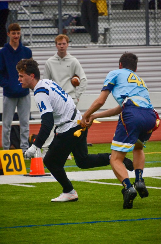 Cape junior Jaxon Benton pulls Landon Scott’s flag.