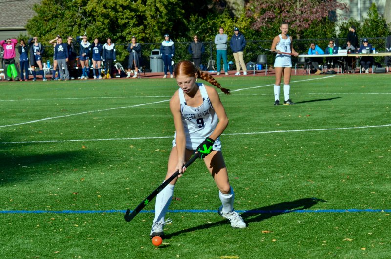 Sussex Academy freshman Emma Orlen settles the rock.