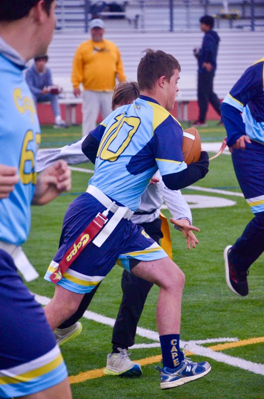 Cape sophomore Luke Archer carries the rock.