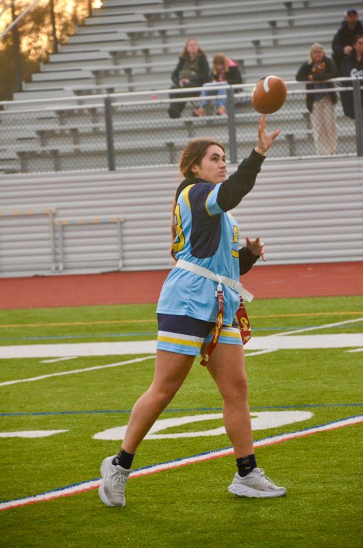 Vikings senior Mya DiSabatino watches her follow through.