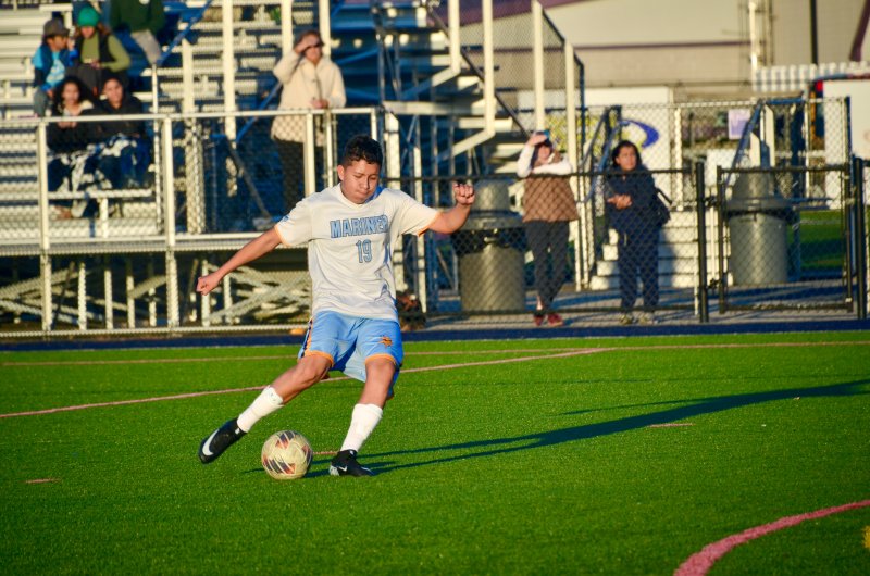 Mariner seventh-grader Juan Panuceno Rodriguez opens the scoring with this free kick.