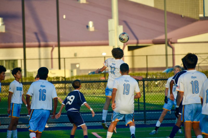 Mariner eighth-grader Vincent Amalfitano flies up on a corner.