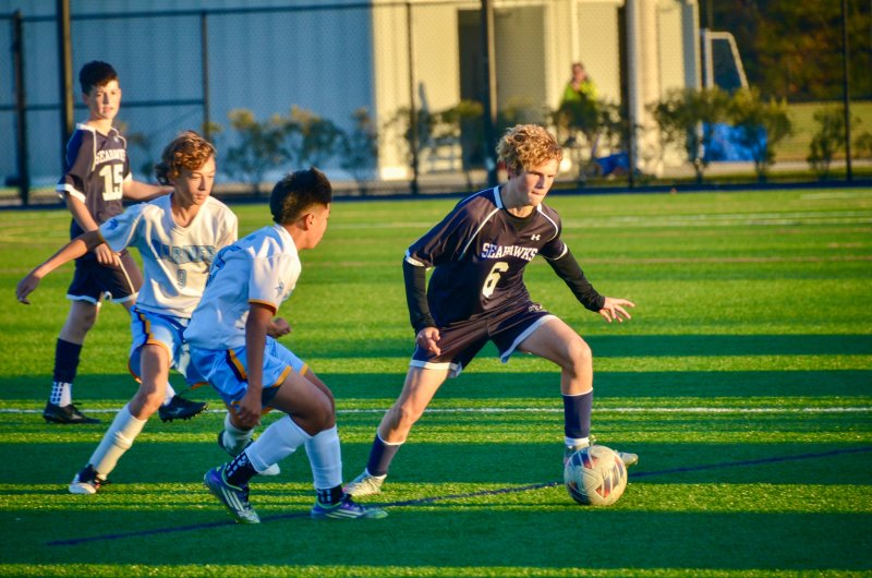 Seahawks eighth-grader Ethan Marsch tries to get past his marker.
