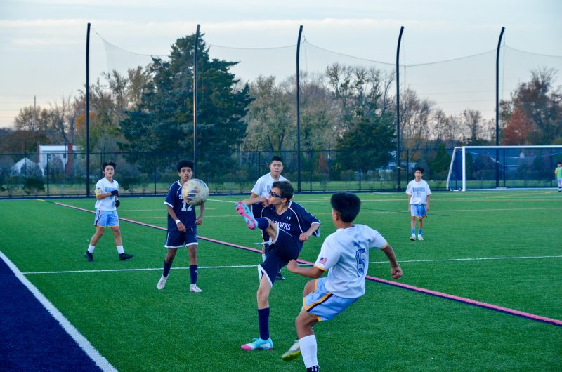 Seahawks seventh-grader Eli Evans tries to keep a ball in.