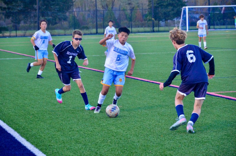 Mariner eighth-grader Bryan Puac-Escalante tries to work down the sideline.