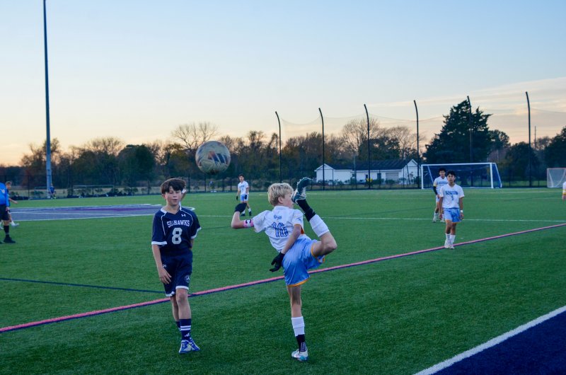 Vikings eighth-grader Liam Tyndall tries to get a touch.
